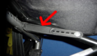 Figure 3: Wheelchair' Plastic Support (marked with a red arrow). 
