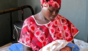 A woman in Uganda holding her child. 