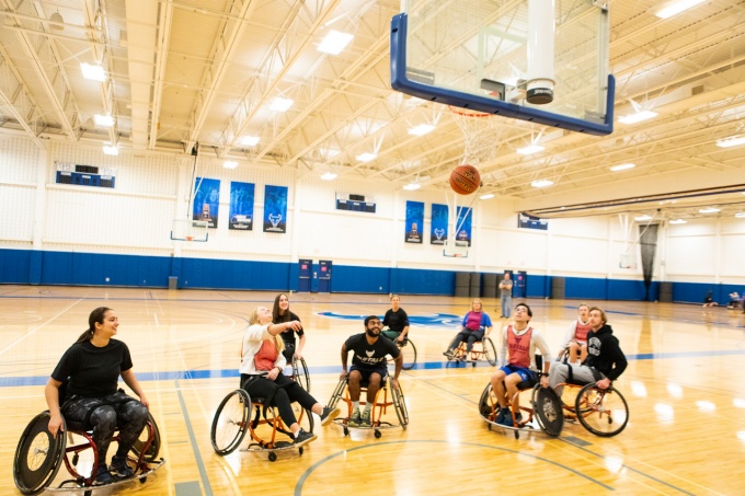 Students participate in a rehabilitation science class focused on adaptive sports in Alumni Arena. 
